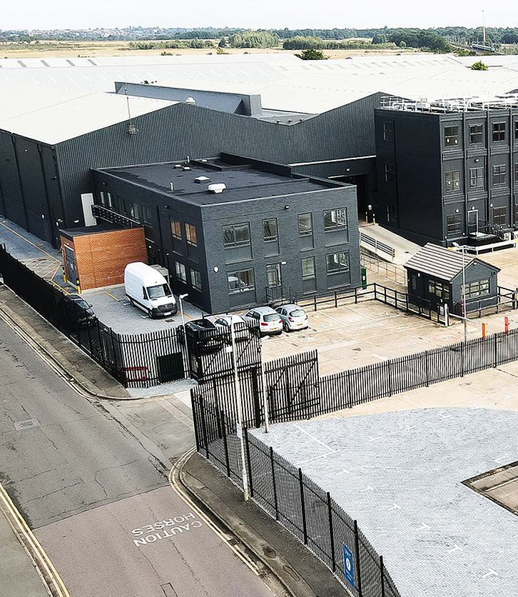 OMA V Film Studios 3 copy Procter Fencing & Security engineers installing timber acoustic fencing panels using Genie lifts – ISO 9001 and CHAS accredited contractors.